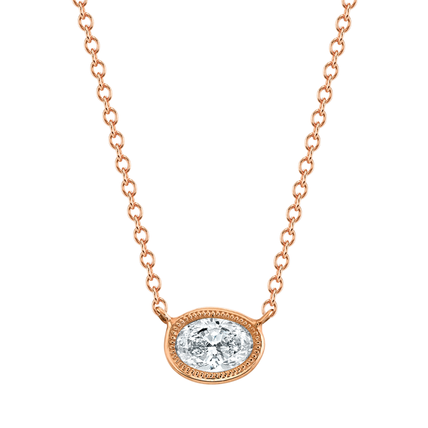Petite Oval Cut Diamond Yellow Gold Bezel Pendant