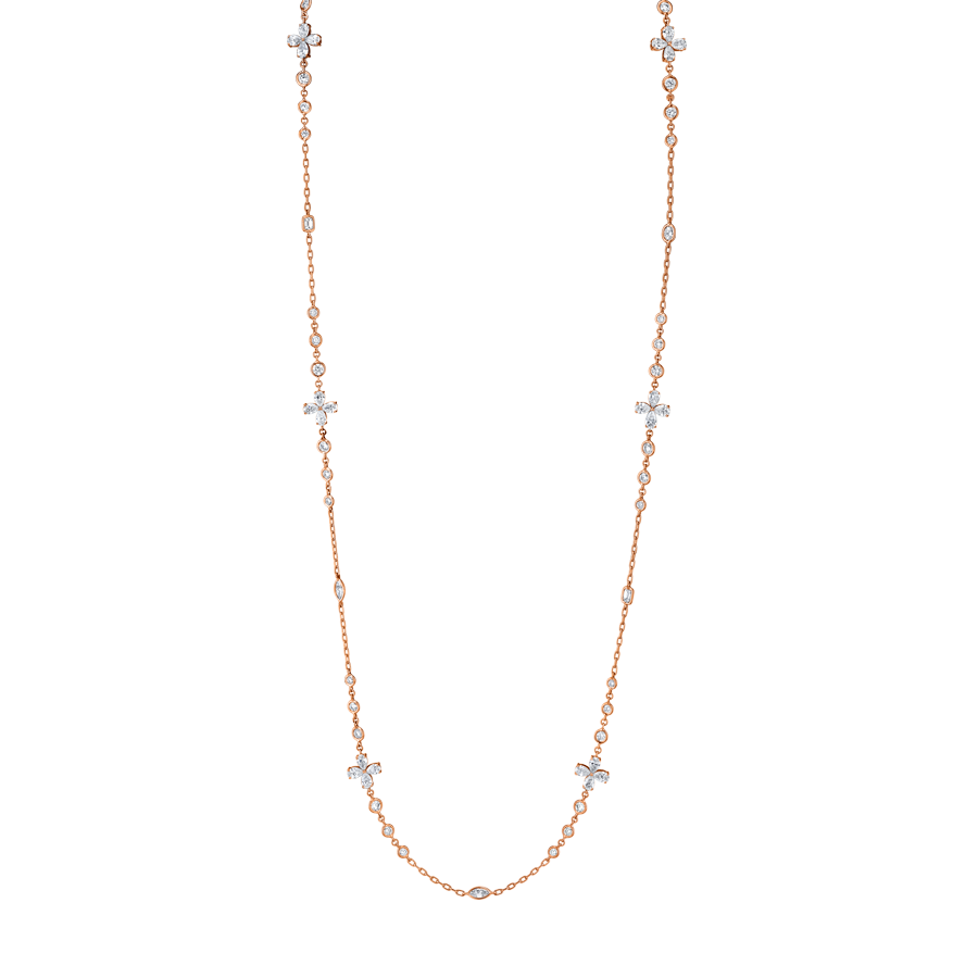 Close-up of mixed shape diamonds by the inch necklace in rose gold showing varied diamond shapes along the chain