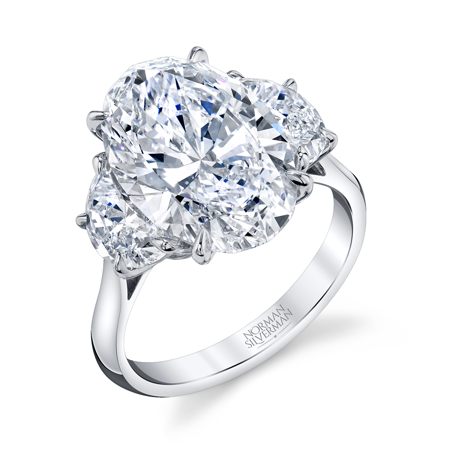 6.05 Carat Platinum Oval-Cut with 2 Half-Moon Shaped Diamond Ring
