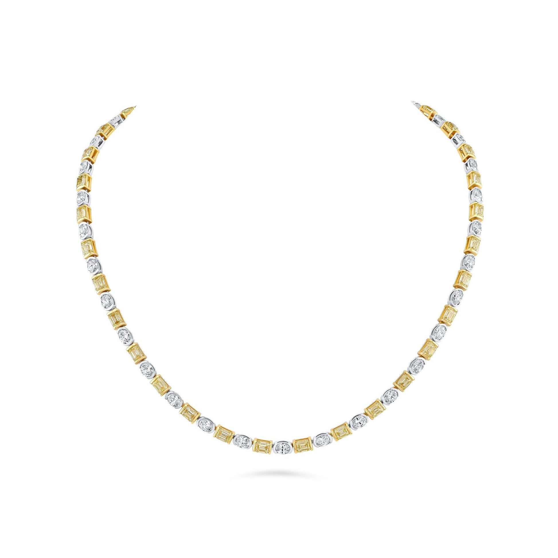 Alternating mixed shape 18k white gold and yellow gold necklace.
