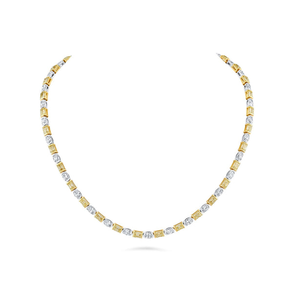 Alternating mixed shape 18k white gold and yellow gold necklace.