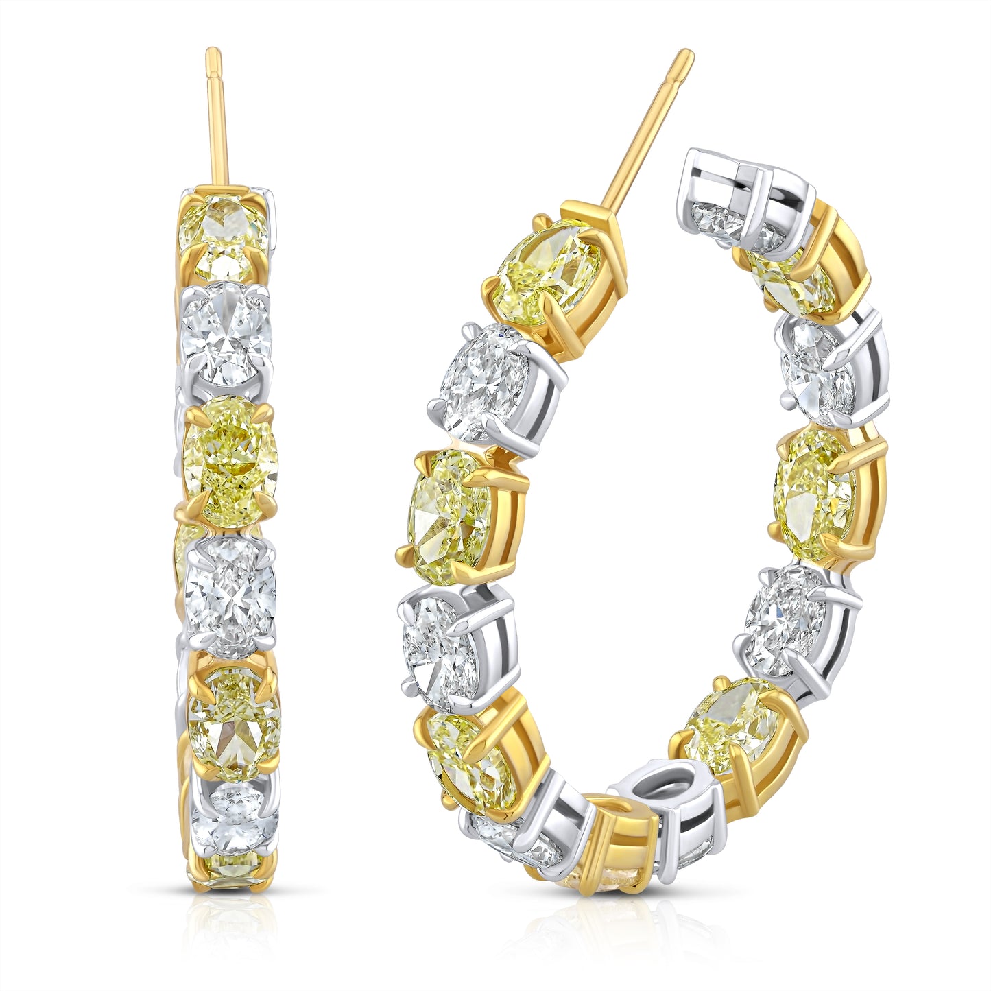 A pair of alternating fancy yellow oval hoop earrings with white diamonds set in yellow and white gold.
