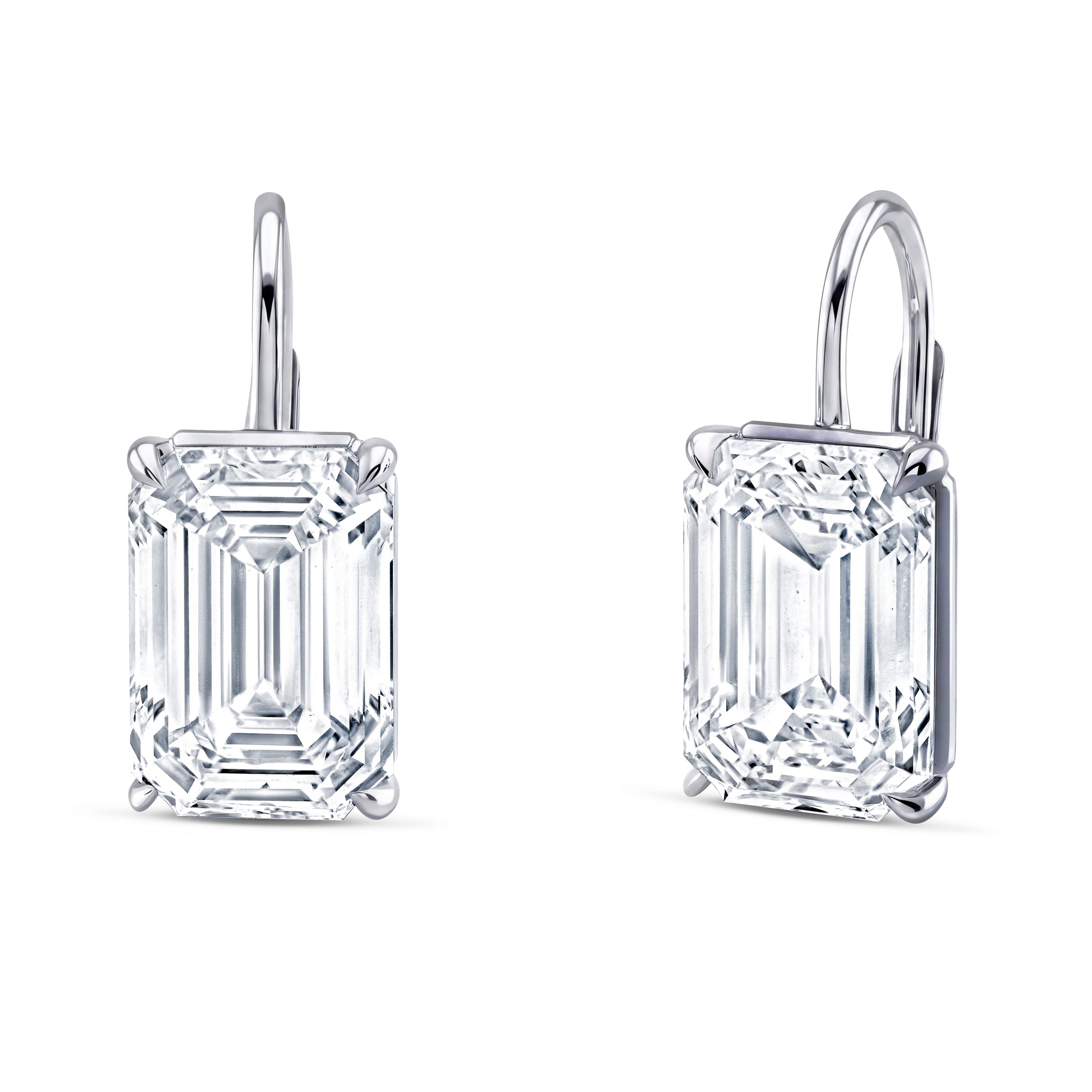 A pair of emerald-cut diamond leverback earrings in 18k white gold, shown from the front and side angles on a clean white background.