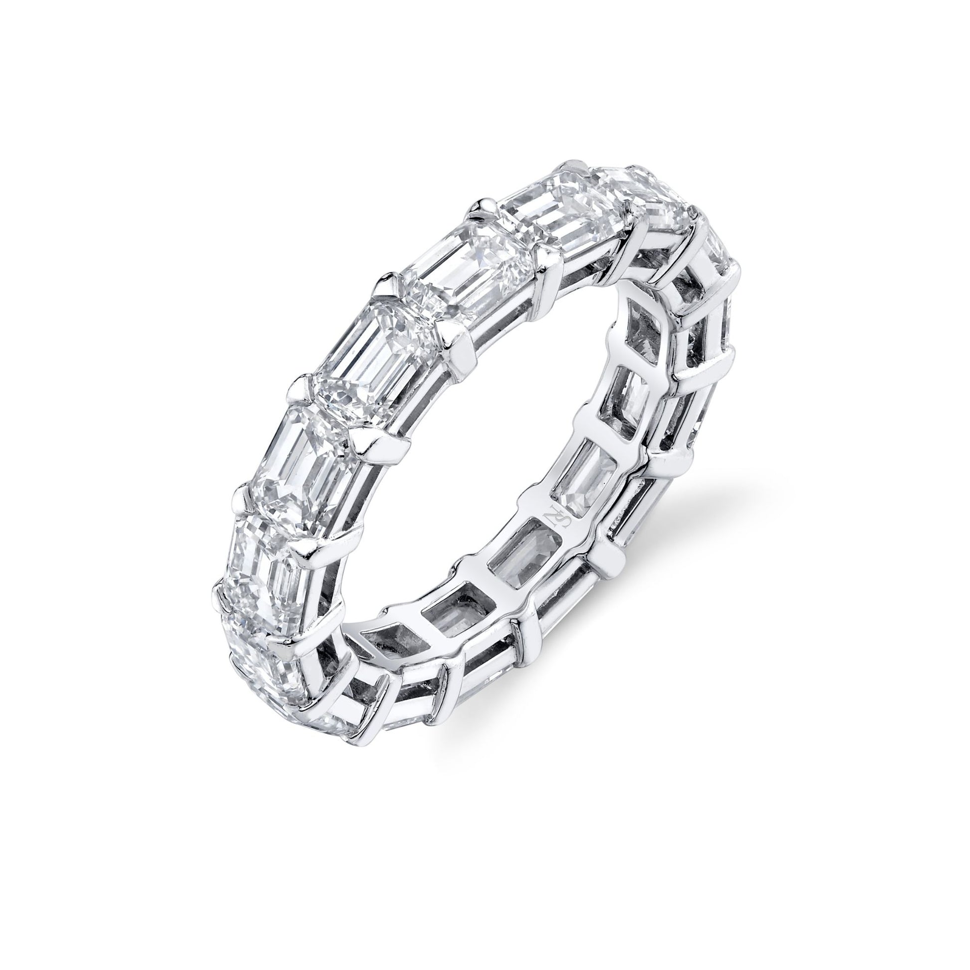 Diamond ring with baguette-cut stones set in platinum.