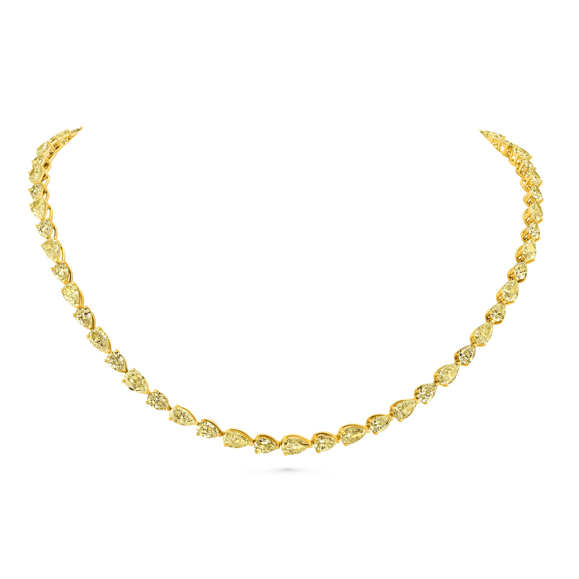 Gold tennis necklace with east west pear yellow diamond on a white background