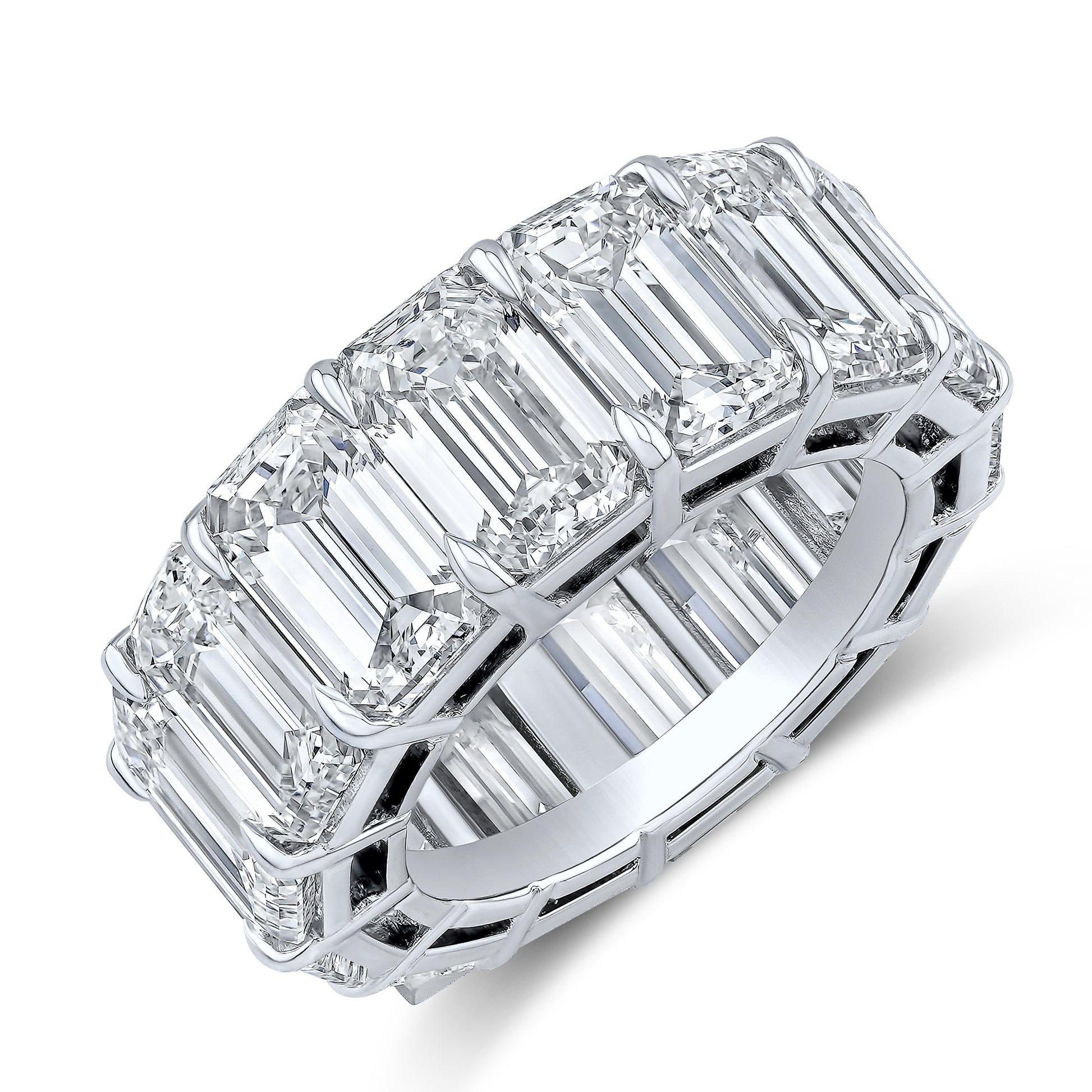 An emerald cut diamond eternity band set in platinum, with multiple diamonds arranged in a continuous row.