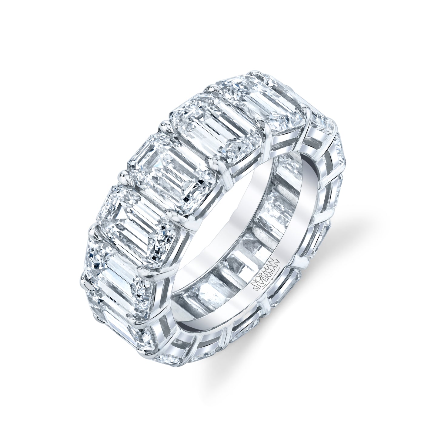 An emerald cut diamond eternity band with platinum setting