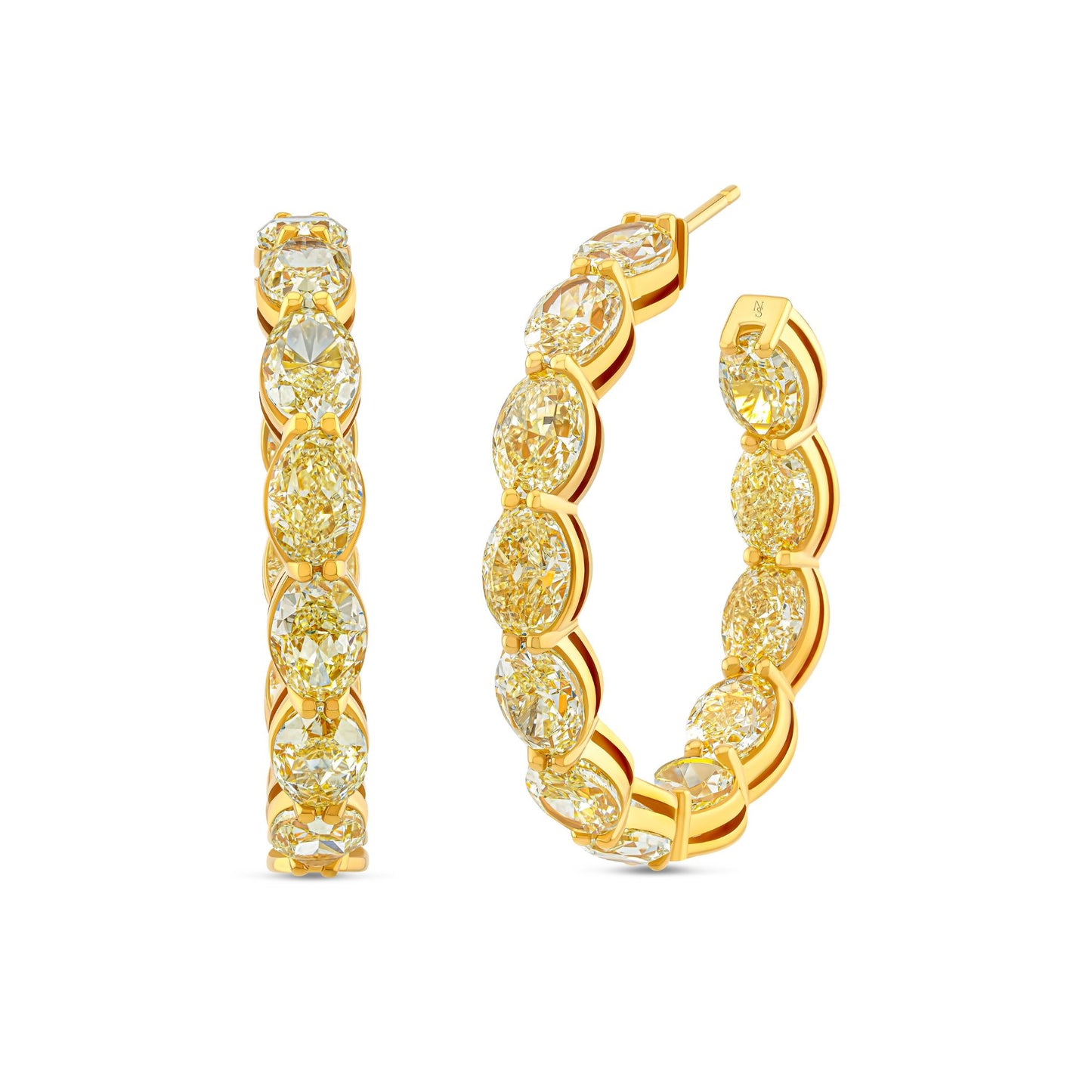 Yellow gold hoop earrings with fancy yellow diamonds inside and outside of the earring.
