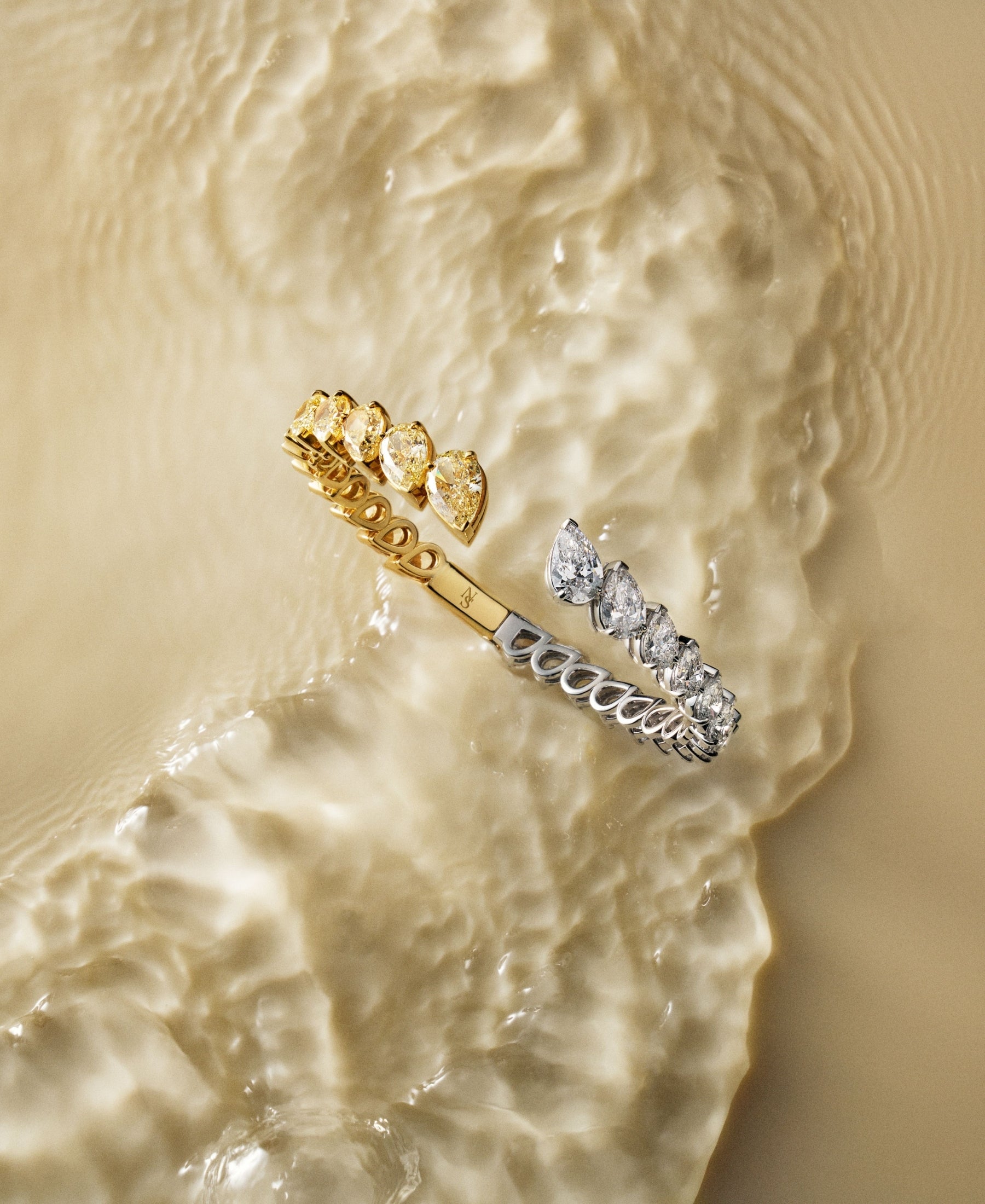 Fancy Yellow and White Diamond Pear Hinged Bangle by Norman Silverman