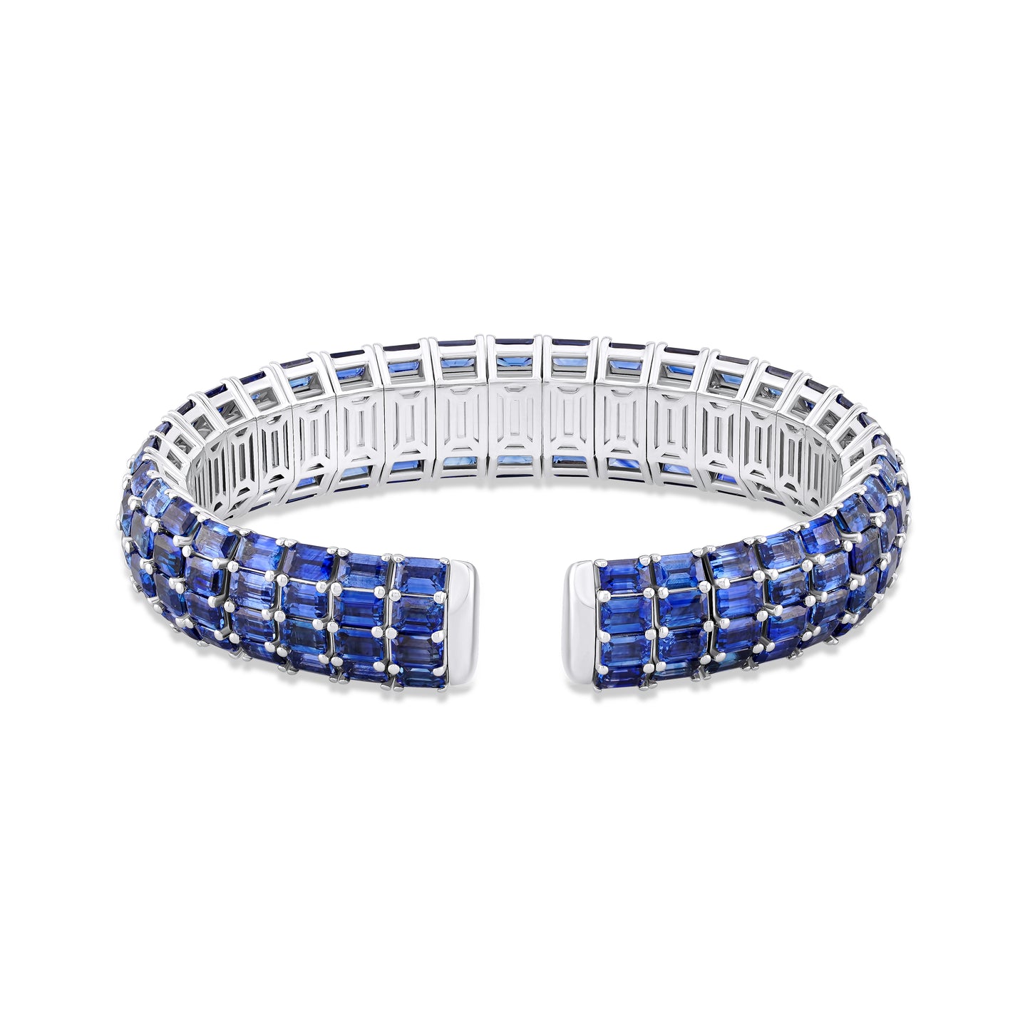 White gold bracelet with blue sapphires on a white background