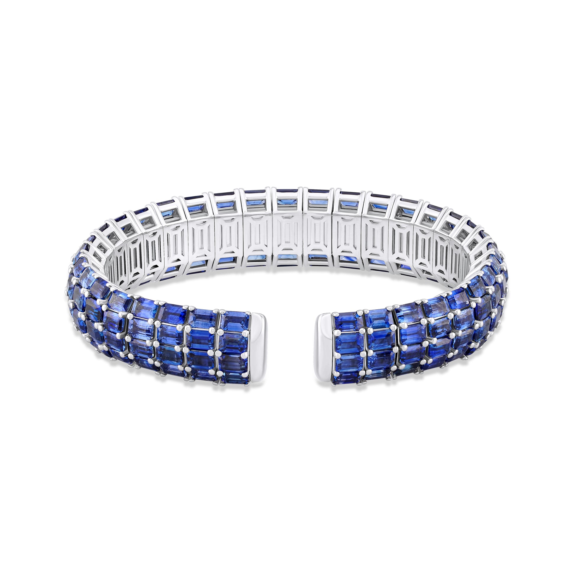 White gold bracelet with blue sapphires on a white background