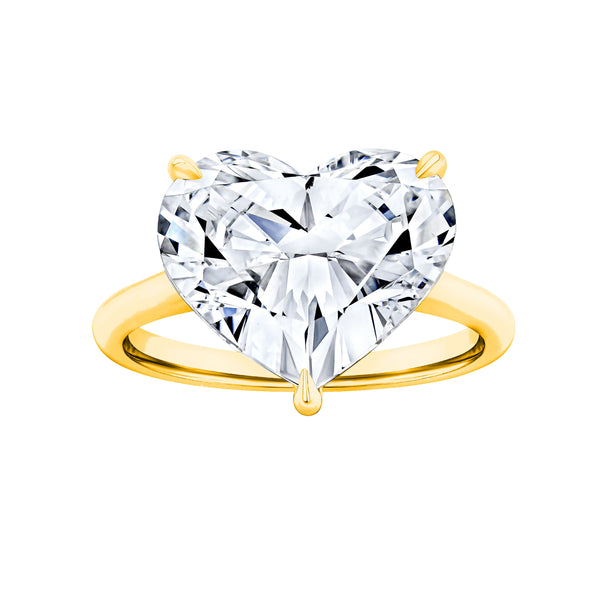 18k gold ring with a heart-shaped diamond.