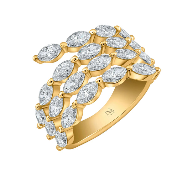 A yellow gold band ring with multiple marquise-cut diamonds set around its circumference.