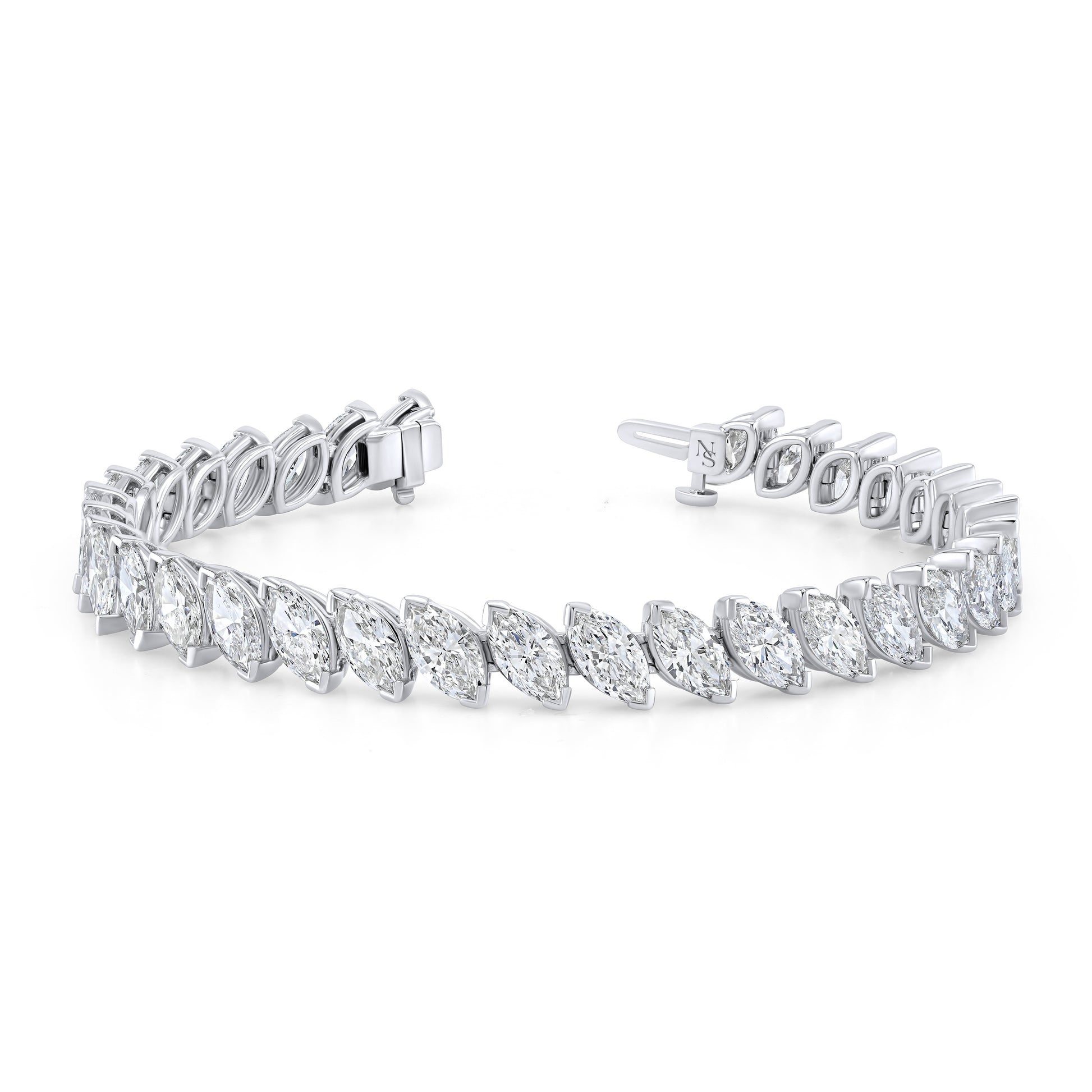 A white gold bracelet featuring marquise-cut diamonds set in a tilted pattern.