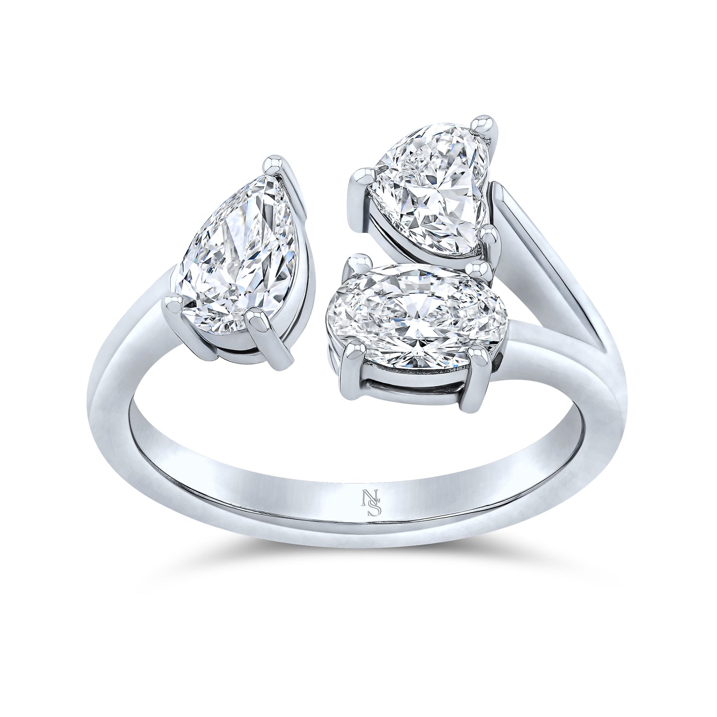 A 18K white gold ring with mixed shape diamond cuts, showcasing a triple stone design.