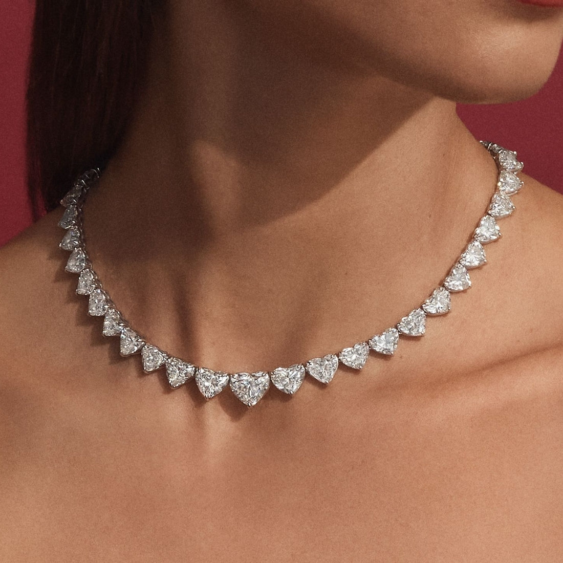 Graduated Heart Shape Diamond Necklace set in platinum.