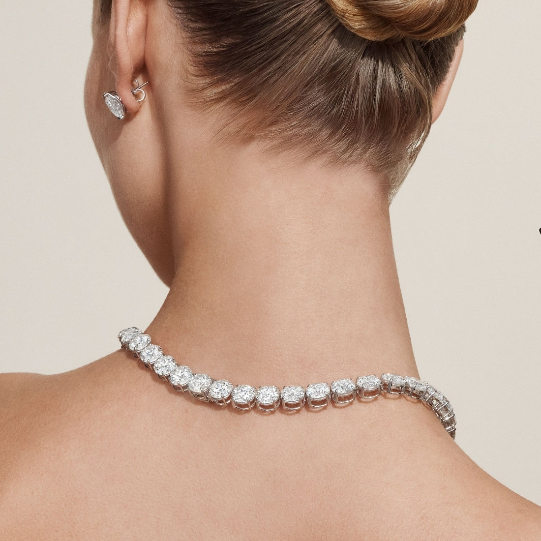 Straight Line Round Diamond Necklace 4-Prong set in platinum by Norman Silverman.