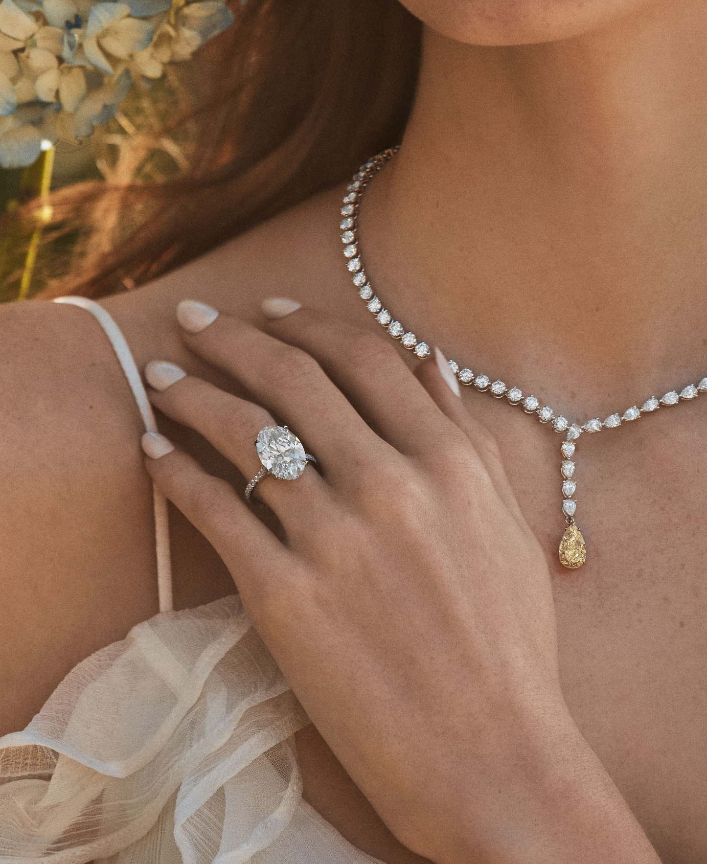 Oval Diamond Solitaire Ring with Pavé Band
