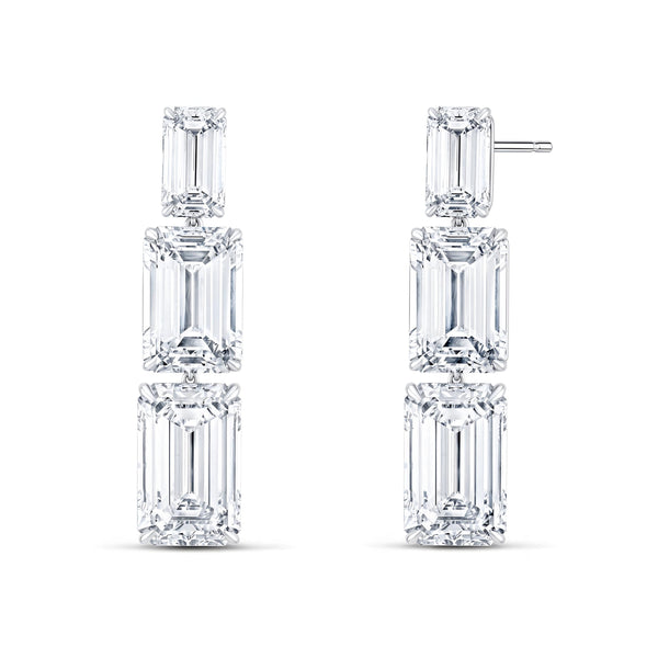 Triple emerald cut diamond earrings