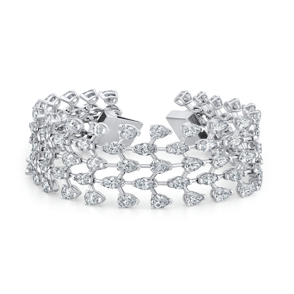 A white gold mesh bracelet featuring a series of pear-shaped and marquise-shaped diamonds.