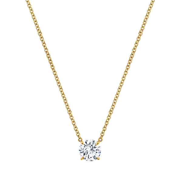 A 18k yellow gold pendant featuring a round brilliant diamond by Norman Silverman Fine Diamond Jewelry