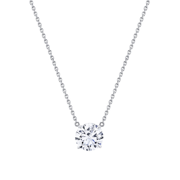 Close-up of round-cut diamond set in 18k white gold pendant by Norman Silverman Los Angeles