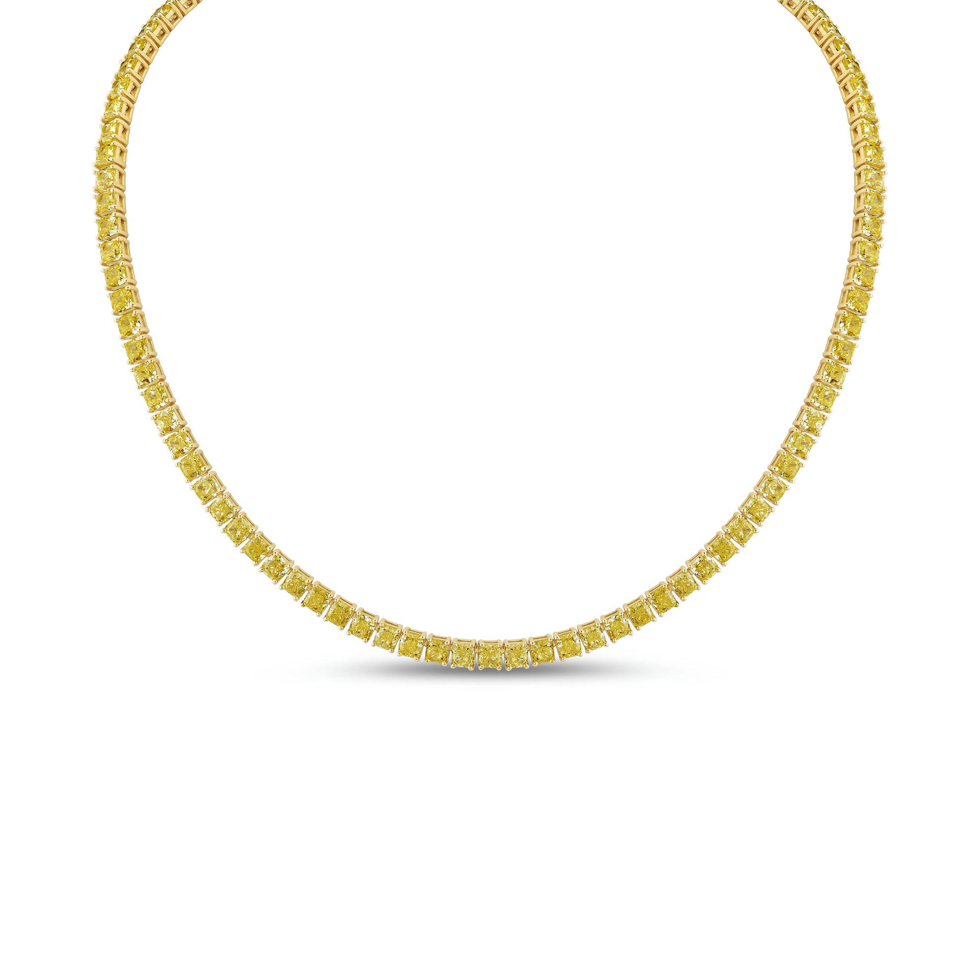 Fancy yellow radiant-cut diamond tennis necklace in yellow gold on white background.