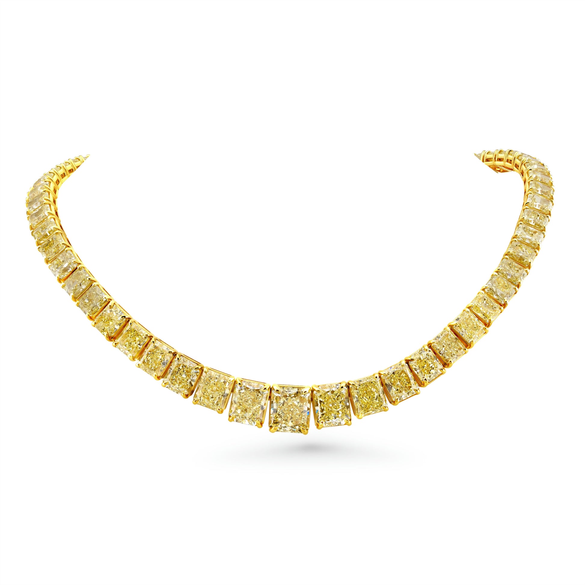 A graduated fancy yellow radiant cut diamonds necklace in 18k yellow gold.