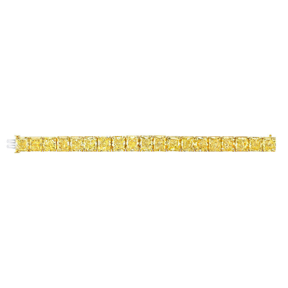 Yellow natural diamond tennis bracelet on white background