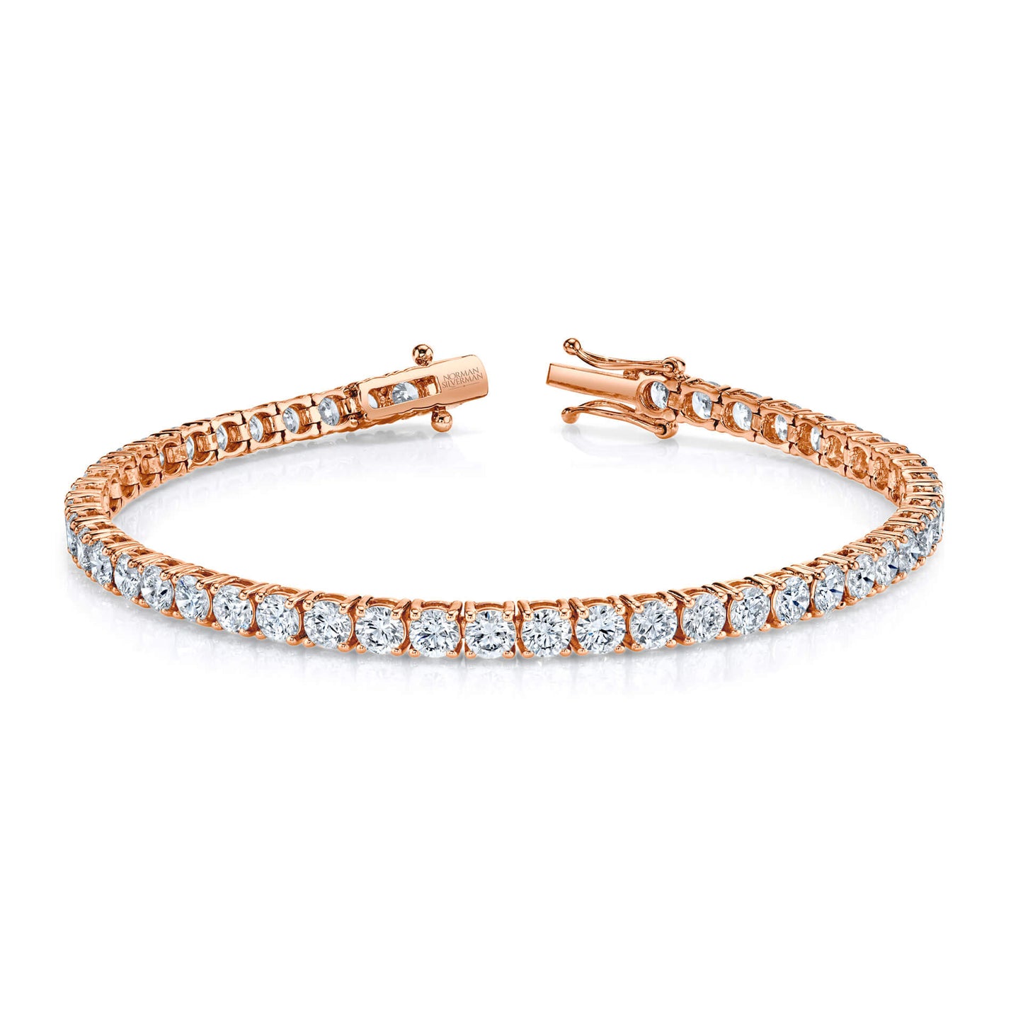 Round Brilliant diamonds set in 4-prong straight line bracelet.