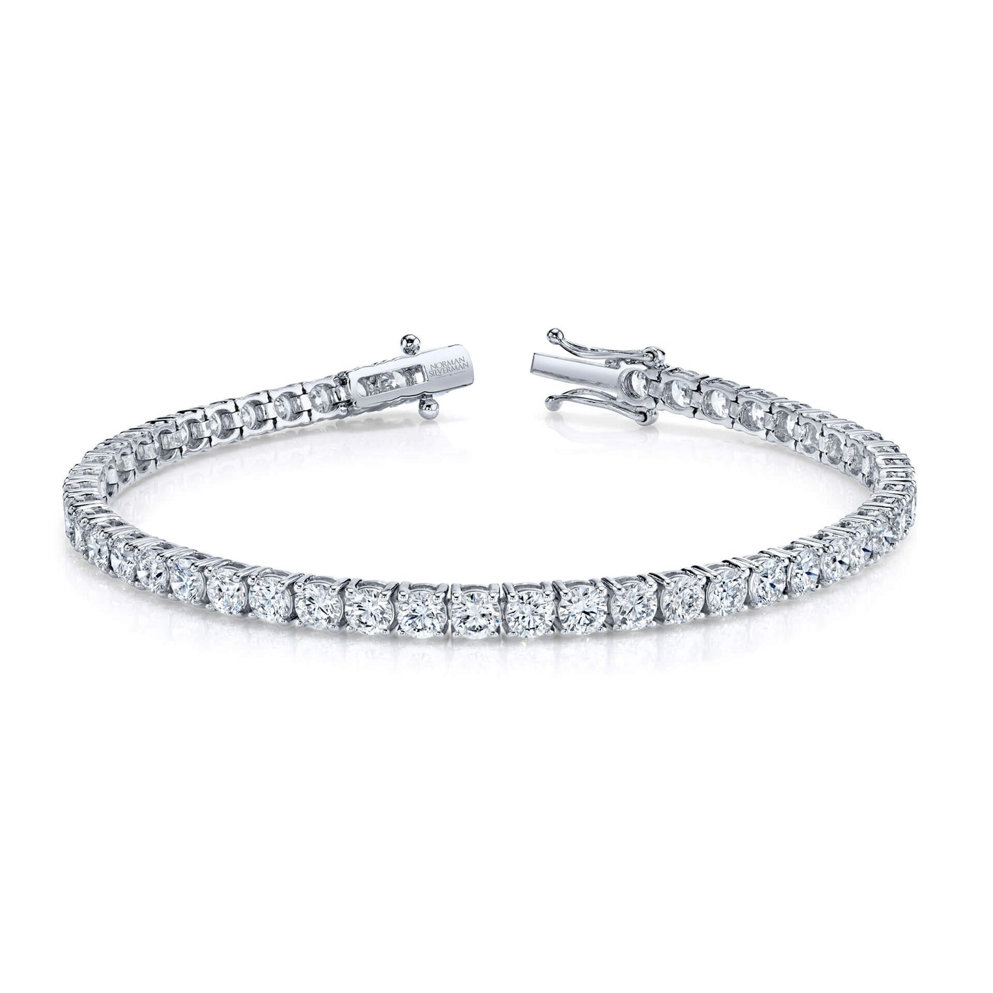Round Brilliant diamonds set in 4-prong straight line bracelet.