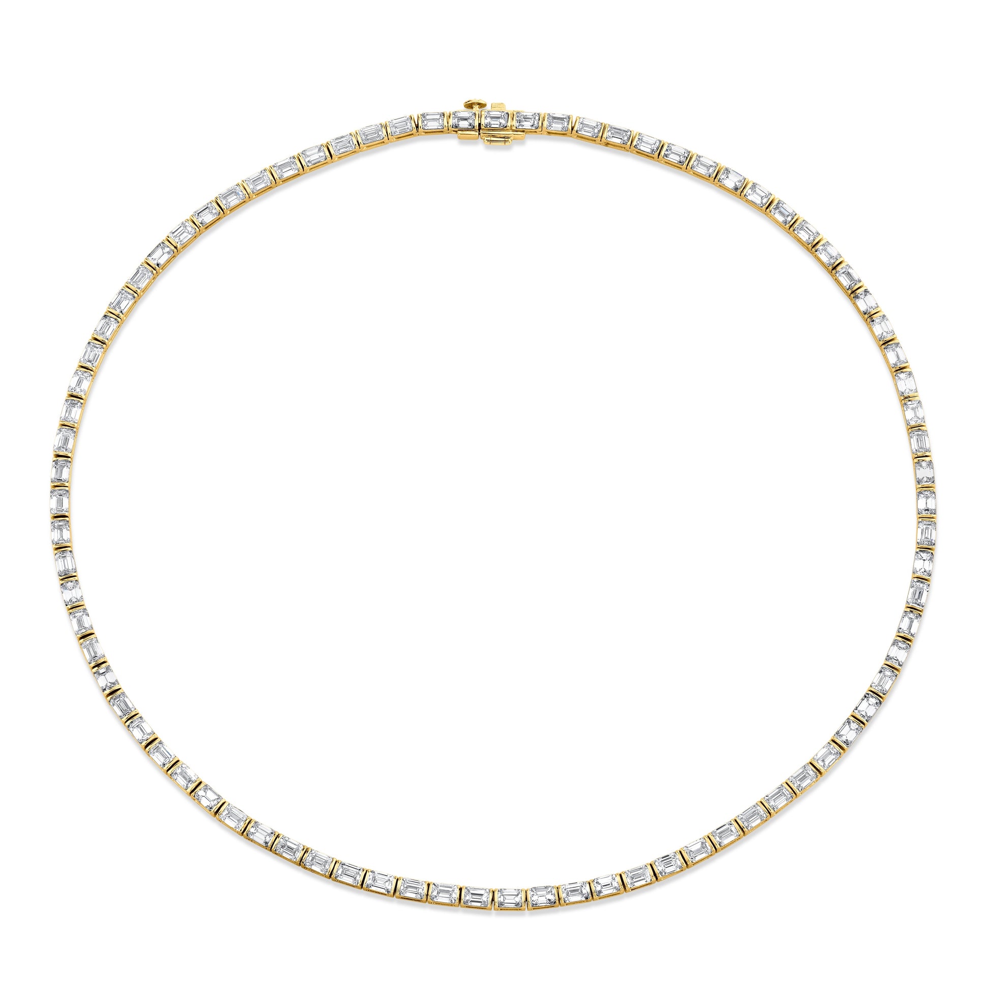 An 18k yellow gold emerald cut diamond bezel-set necklace with multiple diamonds set throughout.