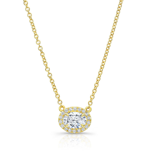 An 18k yellow gold pavé oval cut diamond pendant on a 16-inch chain by Norman Silverman.