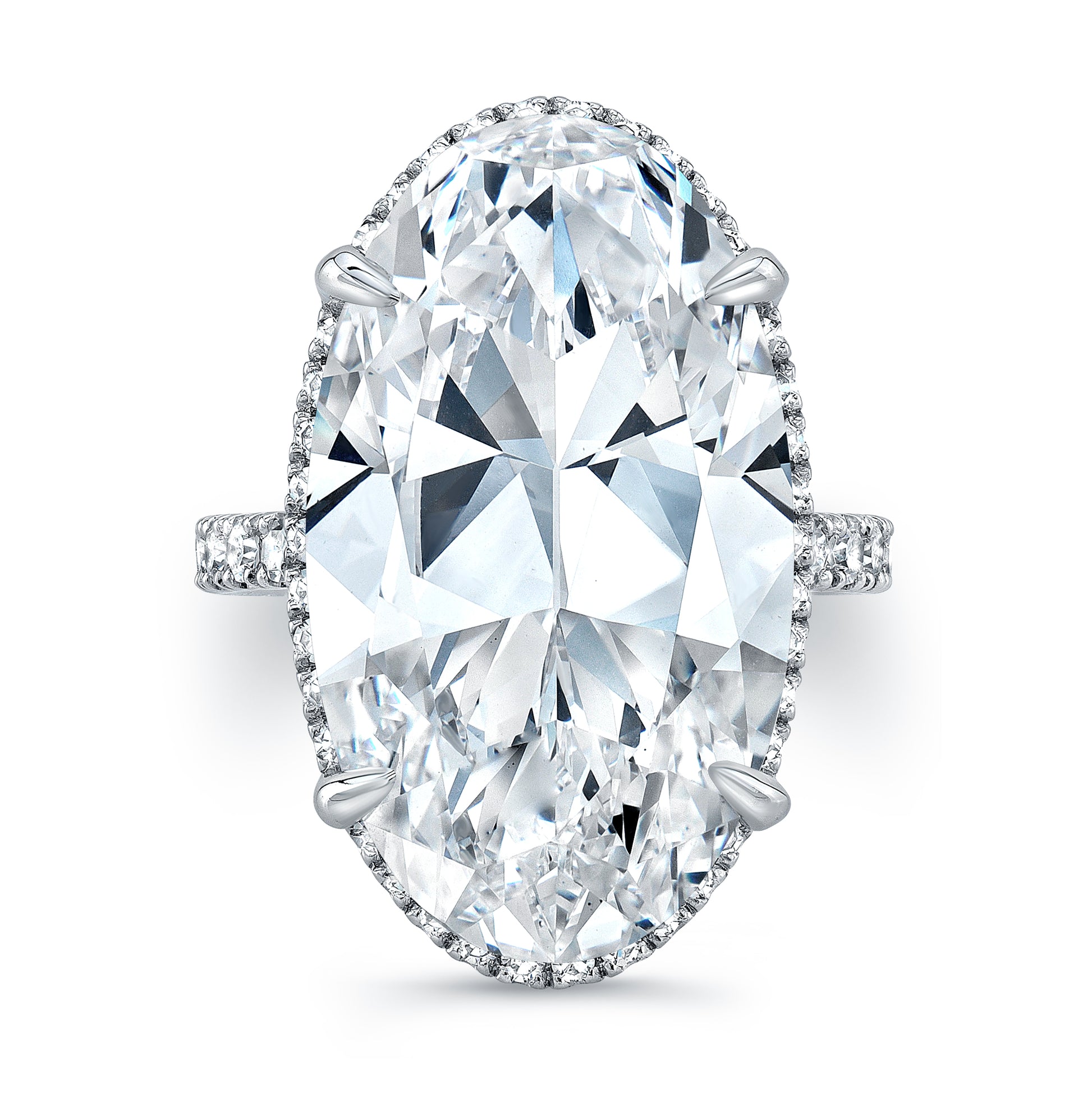 An oval diamond ring with a pavé band, set in platinum.