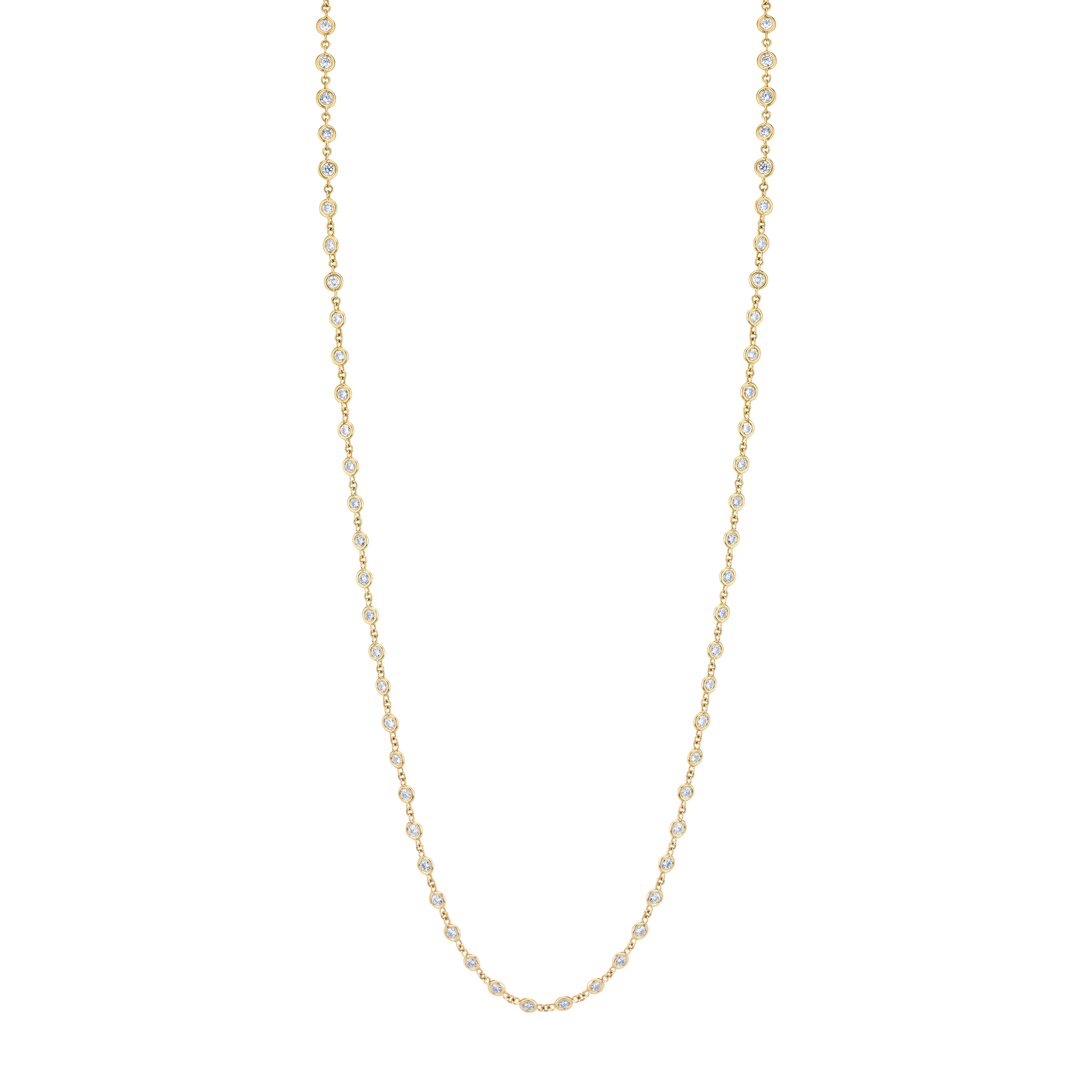 Close-up of round diamonds by the inch necklace in yellow gold highlighting diamond spacing